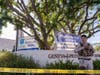 An Orange County Sheriff's Department officer guards the grounds at Geneva Presbyterian Church in Laguna Woods, Calif., Sunday, May 15, 2022, after a fatal shooting. 