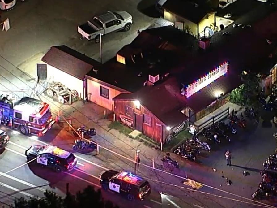 In an image from video, authorities work at the scene of a fatal shooting Wednesday, Aug. 23, 2023, at Cook's Corner, a biker bar in Trabuco Canyon, Calif., in Orange County. 