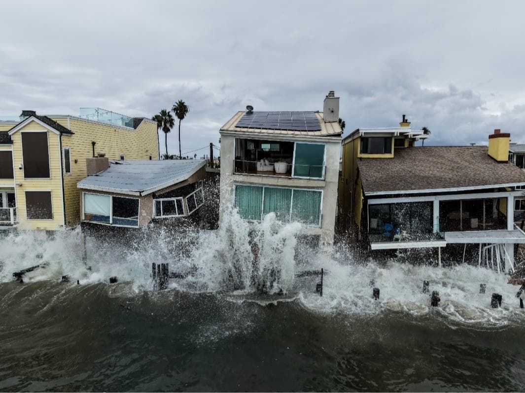 Waves from post-tropical cyclone Rachel crash into beachfront homes in Long Beach, Calif., Monday, Oct. 12, 2026.