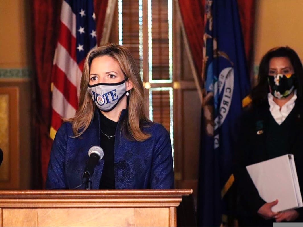 Michigan Office of the Governor, Michigan Secretary of State Jocelyn Benson addresses the state in Lansing, Mich., accompanied by Gov. Gretchen Whitmer.