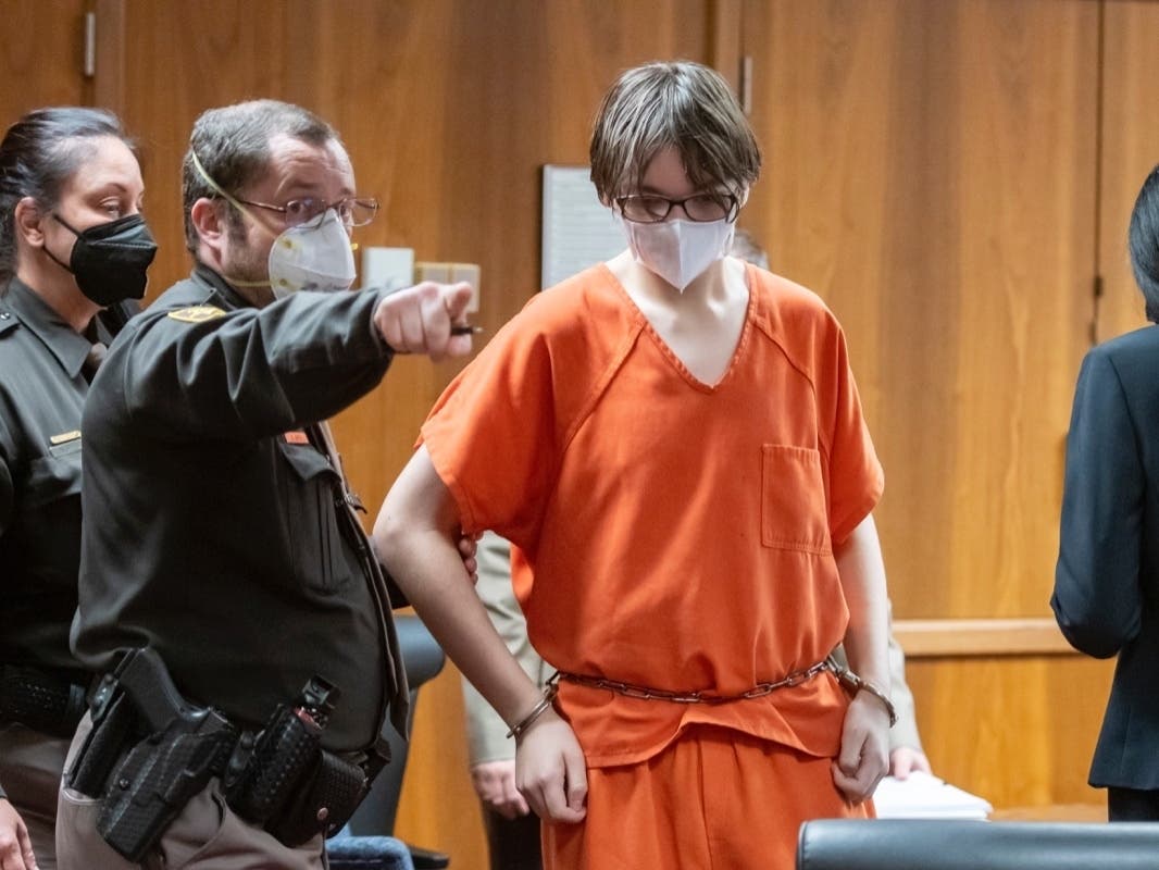 Ethan Crumbley is led away from the courtroom after a placement hearing Tuesday at Oakland County circuit court in Pontiac, Mich.. Crumbley, 15, is charged with the fatal shooting of four fellow students and wounding of seven other people.