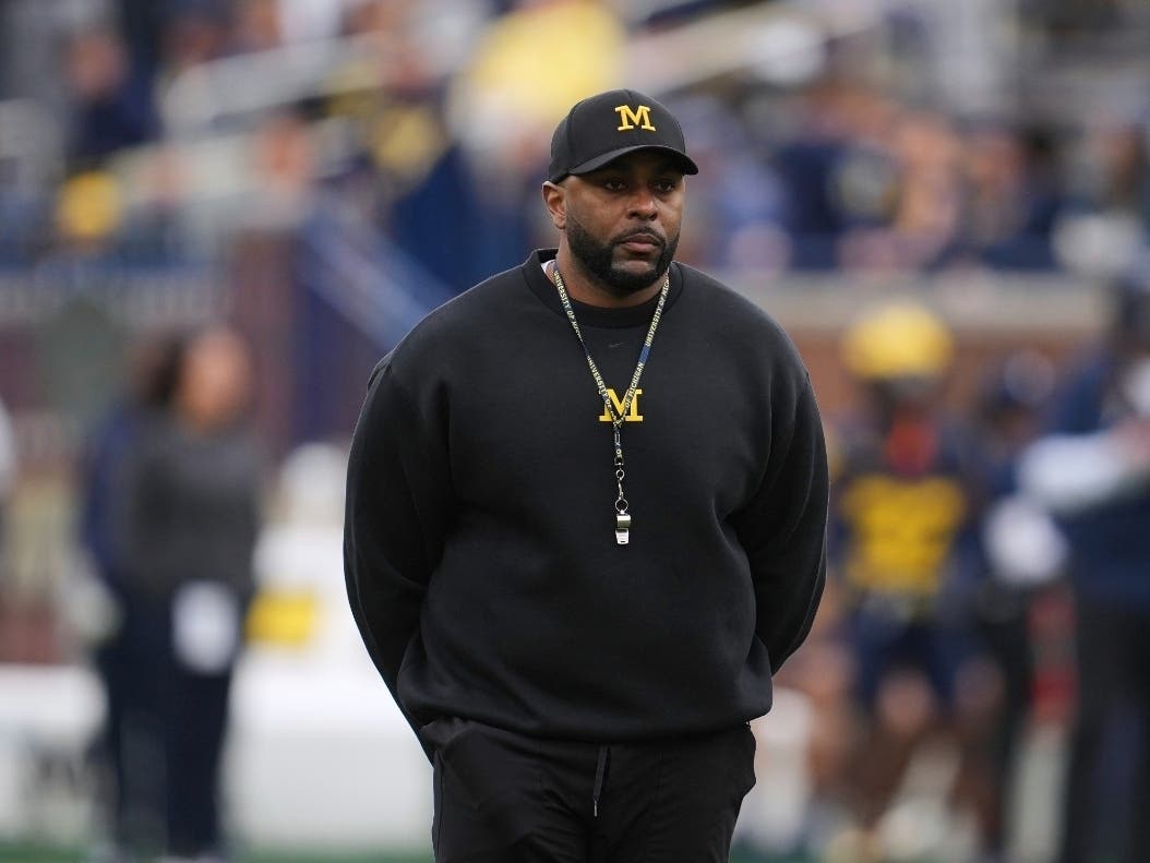 A former University of Michigan football assistant detailed her relationship with former Wolverines football coach Sherrone Moore in a TV interview Friday.
