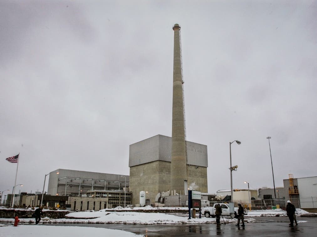 FILE - This photo shows the Oyster Creek nuclear plant and the large square structure that houses the reactor in Lacey Township, N.J., Feb. 25, 2010. 