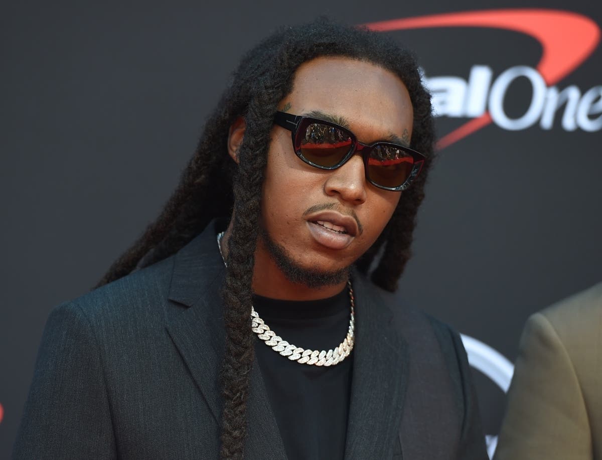 Takeoff arrives at the ESPY Awards in Los Angeles in July 2019. Authorities said Nov. 30 that a man who has been accused of illegally having a gun at the time that rapper Takeoff was fatally shot last month outside a private party in Houston.