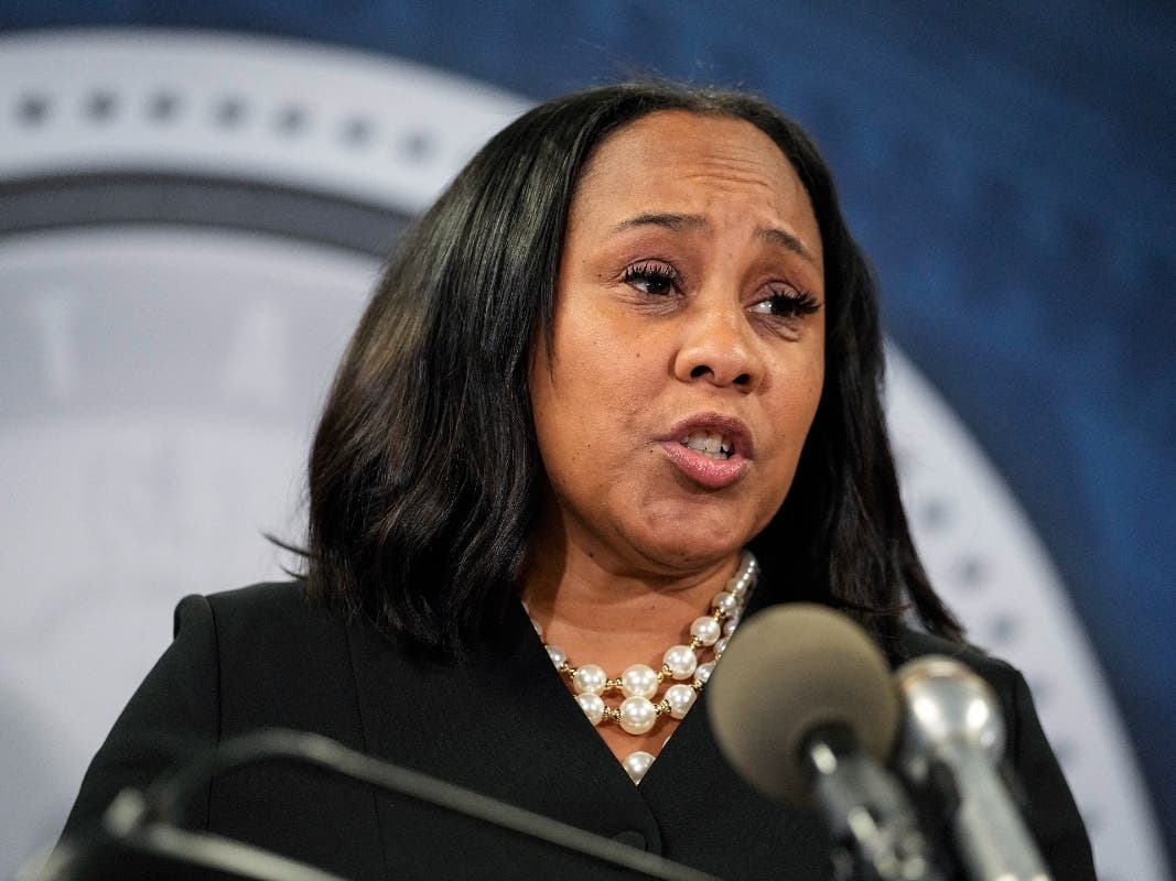 Fulton County District Attorney Fani Willis speaks in the Fulton County Government Center during a news conference, Monday, Aug. 14, 2023, in Atlanta. Donald Trump and several allies have been indicted in Georgia.