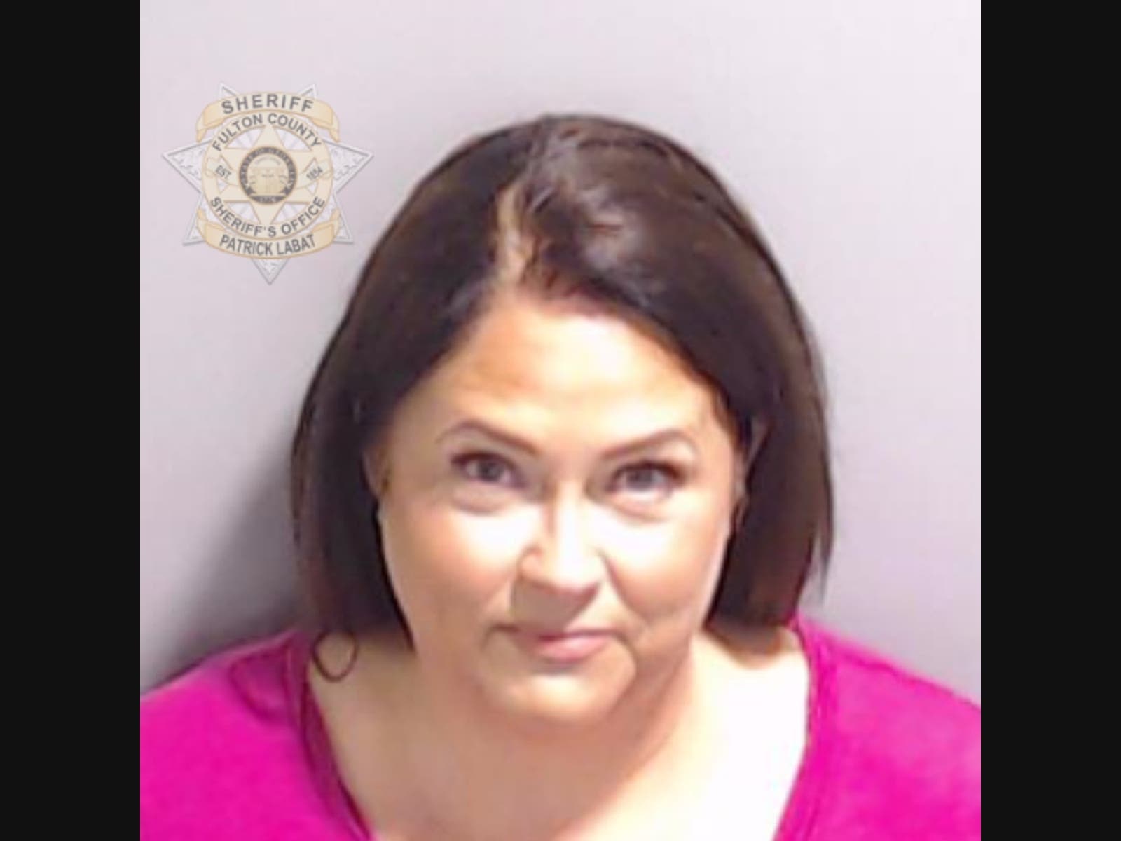 This booking photo provided by the Fulton County Sheriff's Office shows Misty Hampton on Friday, Aug. 25, 2023, in Atlanta, after she surrendered and was booked.