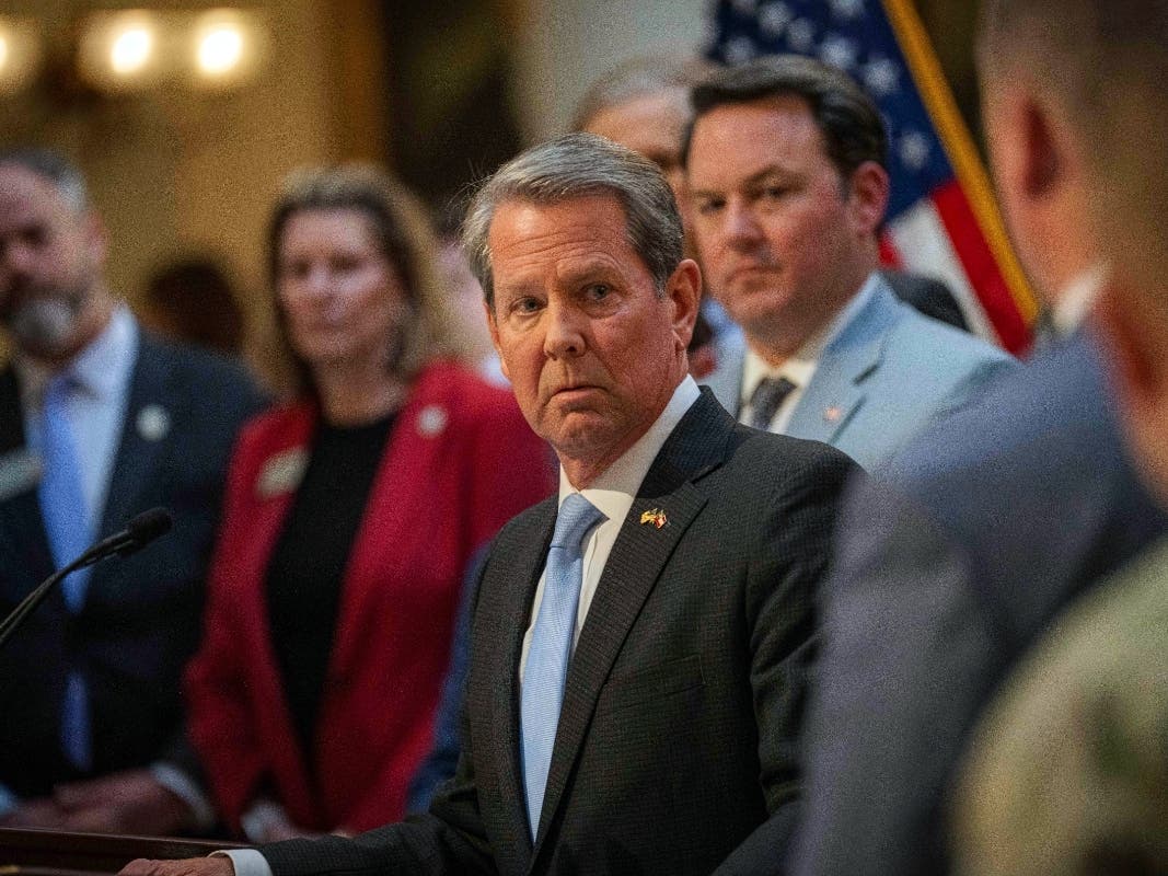 Georgia Gov. Brian Kemp speaks at a press conference at the Capitol in Atlanta, Tuesday, Feb. 13, 2024, announcing a plan to send National Guard troops to Texas along the U.S.-Mexico border.