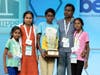 Bruhat Soma, 12, of Tampa, Fla., stands on stage with his family after winning the Scripps National Spelling Bee, in Oxon Hill, Md., Thursday, May 30, 2024.