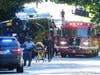 A Gwinnett County Ga. commuter bus sits in the road where it was stopped in Smoke Rise, Ga., on Tuesday, June 11, 2024. Atlanta police say the transit bus fled from officers responding to a dispute on board, leading them on a wild and lengthy chase.