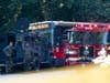 A Gwinnett County, Ga. commuter bus sits in the road where it was stopped in Smoke Rise, Ga., on Tuesday, June 11, 2024. Atlanta police say the transit bus fled from officers responding to a dispute on board, leading them on a wild and lengthy chase.