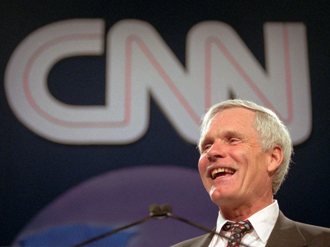 In this May 4, 1995, file photo, Ted Turner laughs as he speaks during the CNN World Report Contributors banquet in Atlanta. 