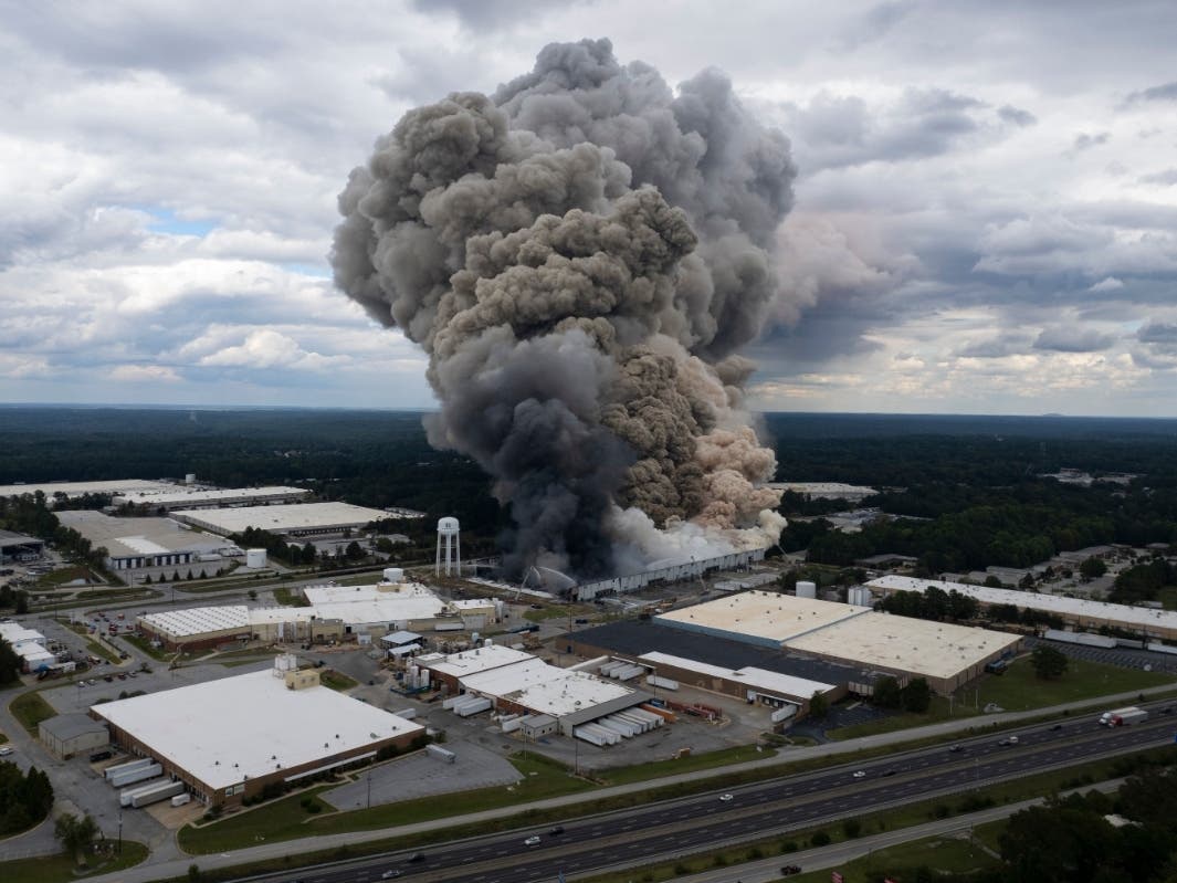 FILE - Smoke billows from a fire at the BioLab facility in Conyers, Ga., Sunday, Sept. 29, 2024.