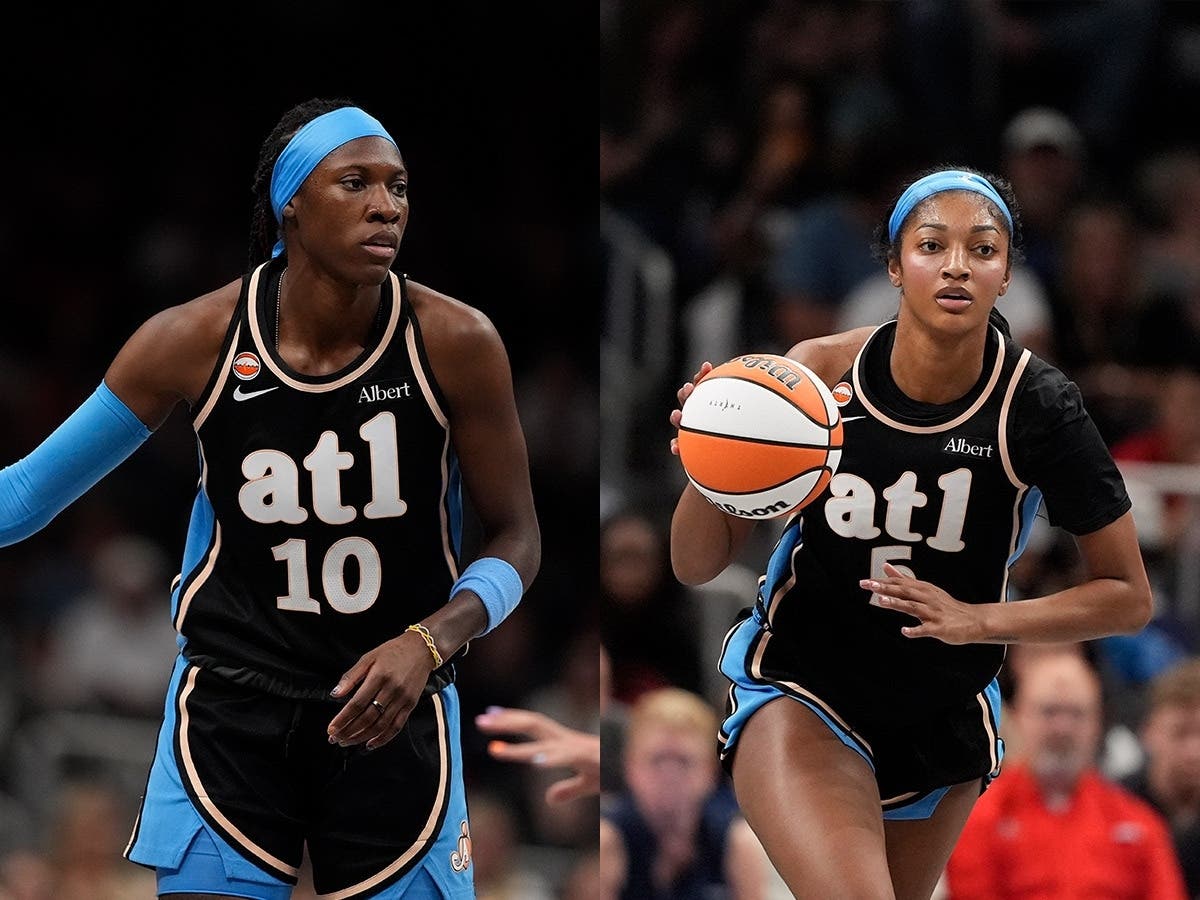 Atlanta Dream guard Rhyne Howard and forward Angel Reese in the first half of a WNBA basketball game against the Indiana Fever on Sunday, Aug. 16, 2026, in Atlanta.