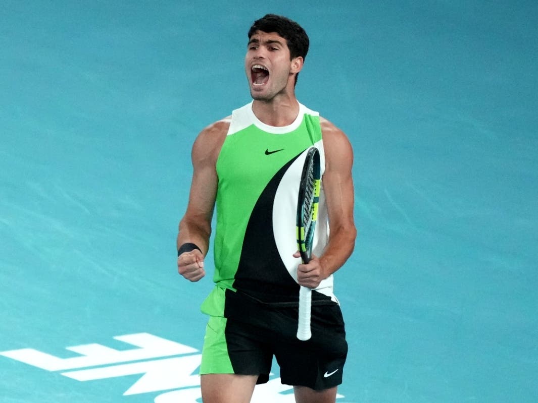 Carlos Alcaraz of Spain reacts during the men's singles final match against Novak Djokovic of Serbia at the Australian Open tennis championship in Melbourne, Australia, Sunday, Feb. 1, 2026.