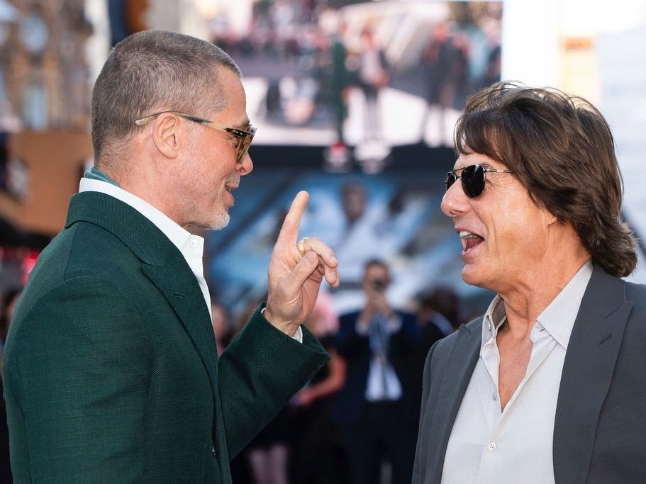 Brad Pitt and Tom Cruise were actually photographed together at a London movie premiere in June.
