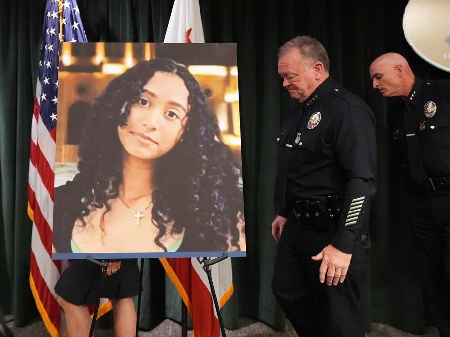 LAPD Chief Jim McDonnell walks past an image of Celeste Rivas Hernandez Monday, April 20, 2026, in Los Angeles after a press conference regarding her killing.
