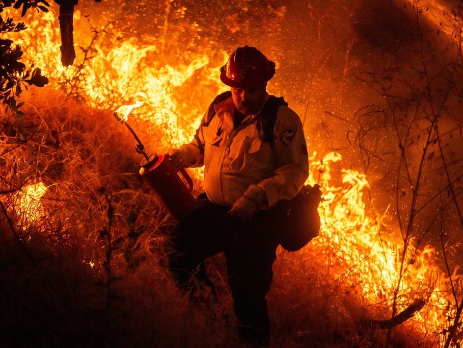 Fire crews conduct a firing operation to control the Sandy Fire Monday, May 18, 2026, in Simi Valley, Calif.