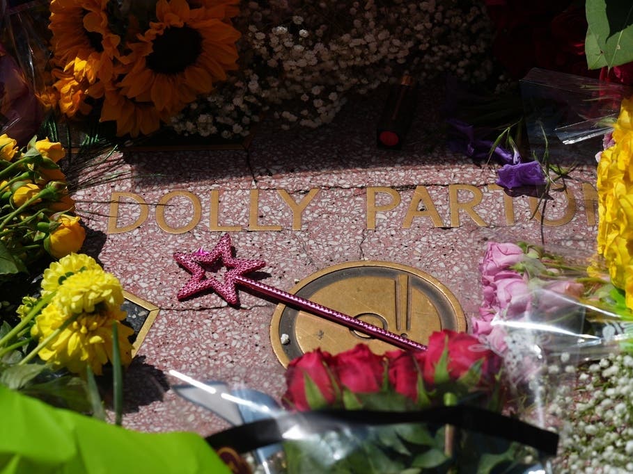 Repair crews were working Tuesday to repair the late Dolly Parton's Hollywood Walk of Fame star after it was vandalized.