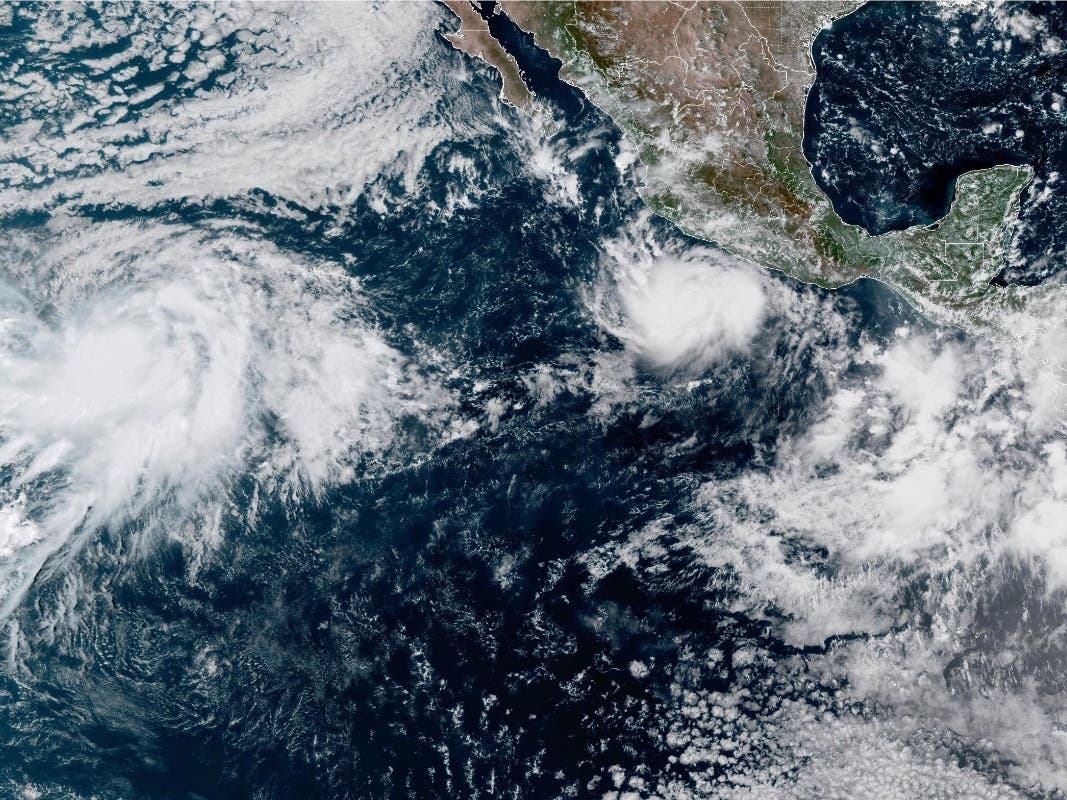 This photo provided by NOAA shows Hurricane Polo intensifying in the Pacific Ocean off the coast of Mexico on Monday.
