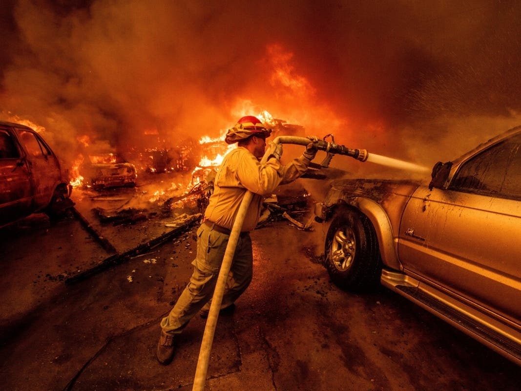 A firefighter battles the Eaton Fire, Jan. 8, 2025, in Altadena.