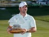 Chris Gotterup smiles as he holds up the winner's trophy after defeating Hideki Matsuyama in a one hole playoff the Phoenix Open golf tournament Sunday, Feb. 8, 2026, in Scottsdale, Ariz.