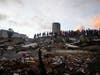 Rescuers search through the rubble of buildings that collapsed in the earthquakes in La Guaira, Venezuela, Tuesday, June 30, 2026.