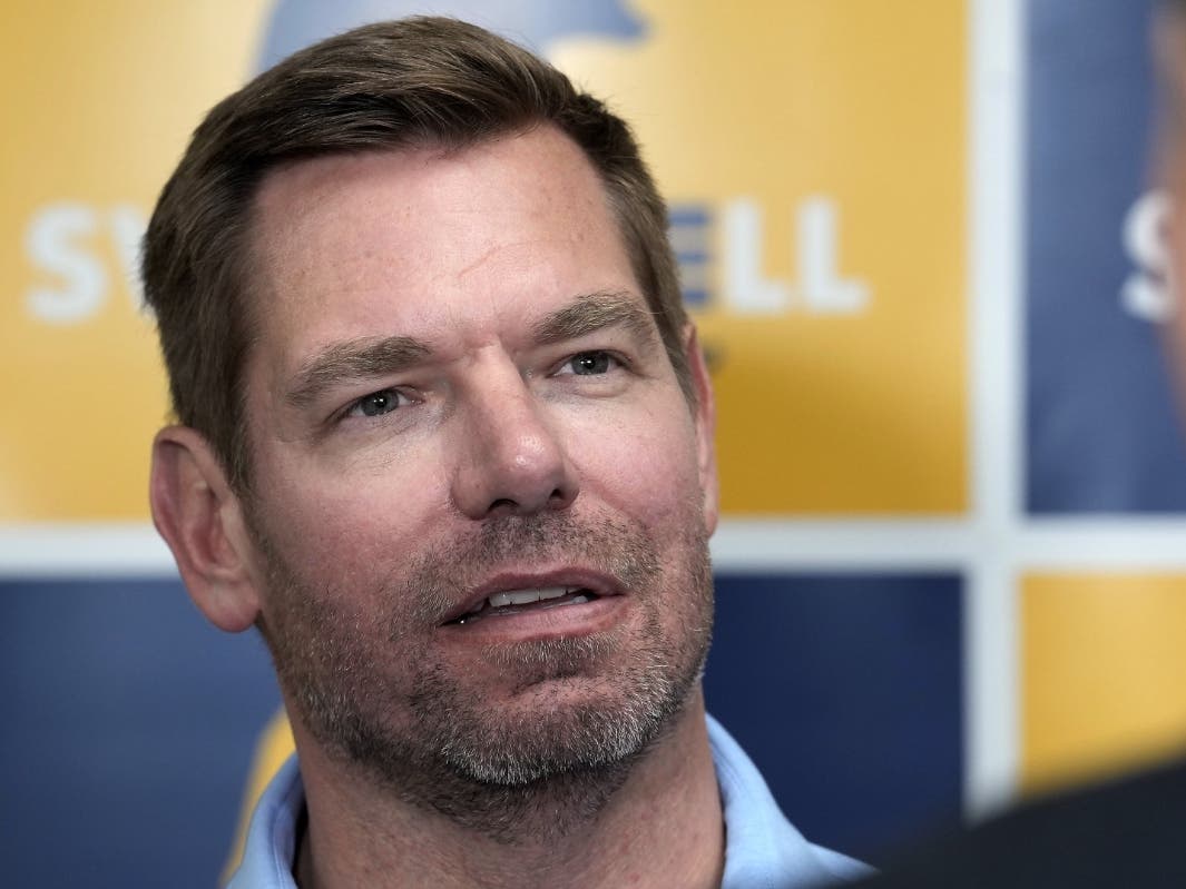 Eric Swalwell, D-Calif., talks with reporters after holding a town hall meeting in Sacramento, Calif., April 7, 2026.