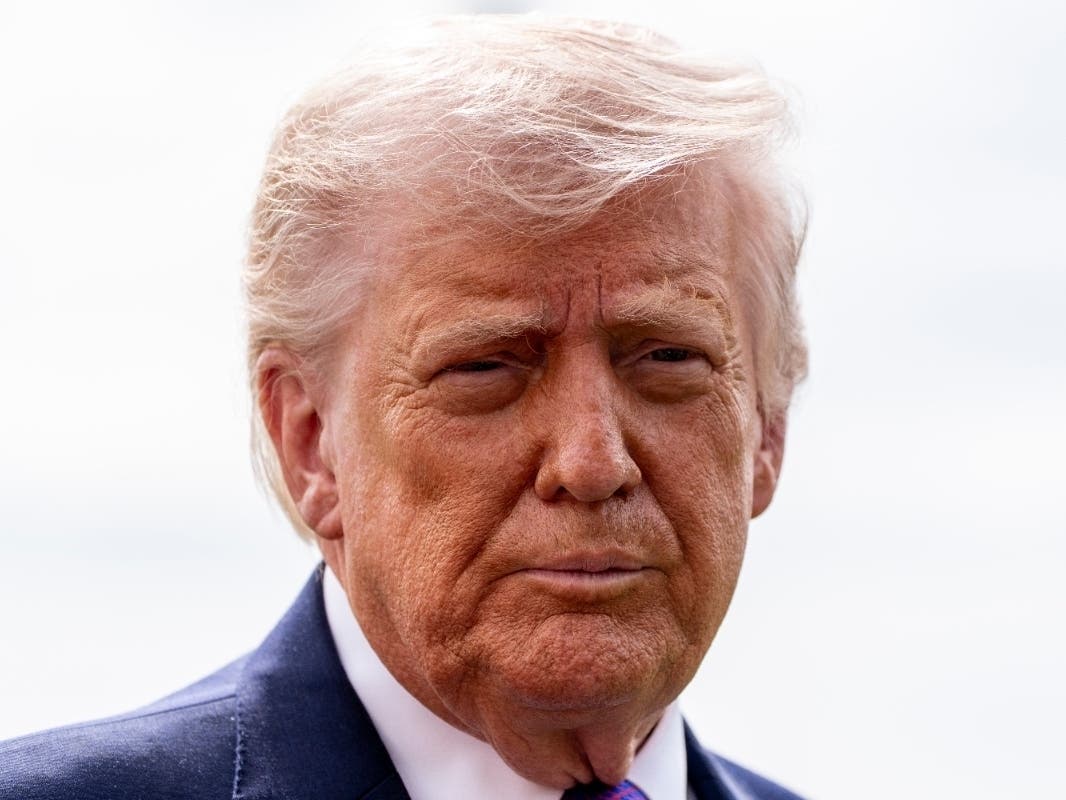 President Donald Trump speaks with reporters before departing on Marine One from the South Lawn of the White House, Wednesday, March 11, 2026, in Washington. 