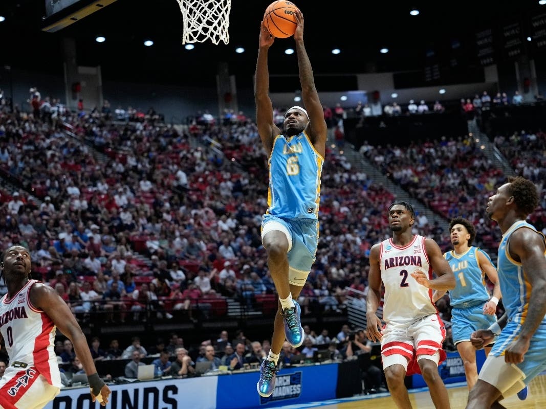 LIU forward Mason Porter-Brown (6) dunks against Arizona during the second half in the first round of the NCAA college basketball tournament, Friday, March 20, 2026, in San Diego.