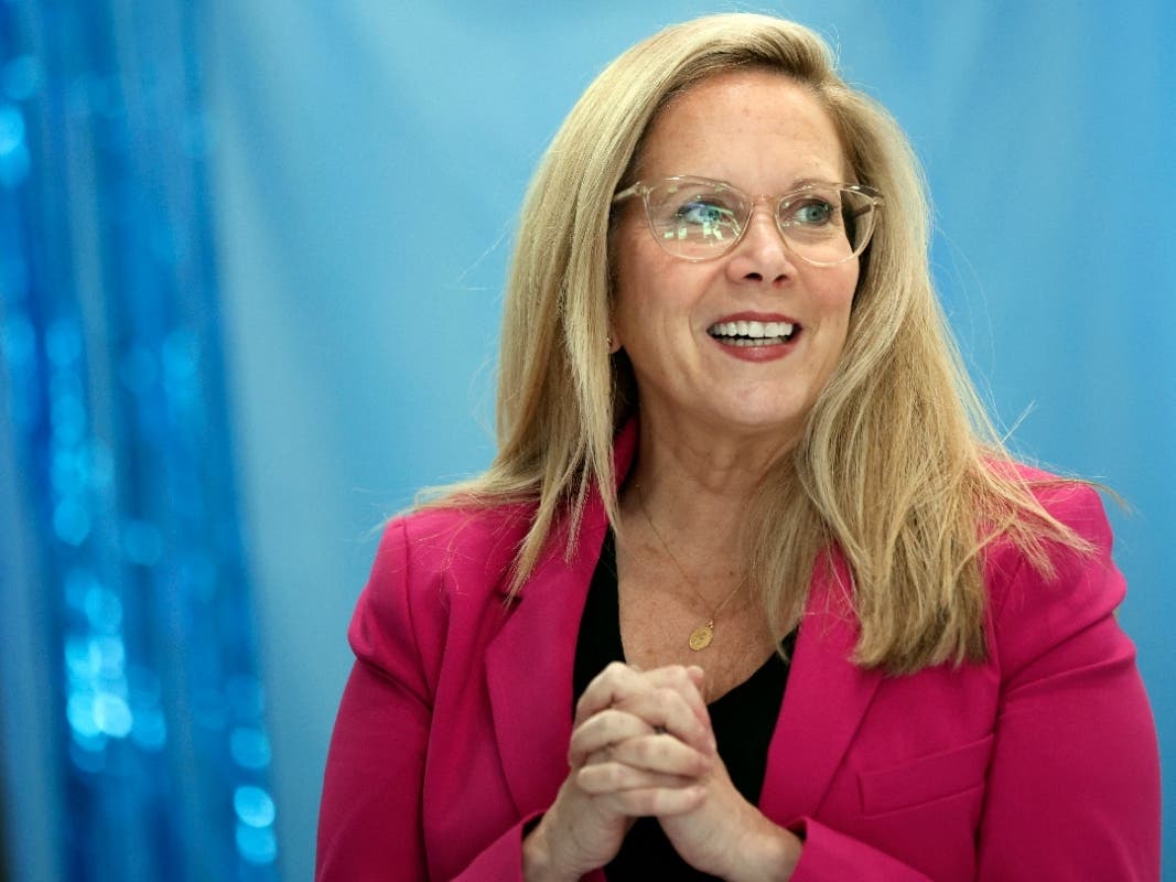 Laura Gillen, Democratic candidate for New York's 4th Congressional District, reacts before a roundtable discussion outlining her policy platform to lower healthcare costs for Latino families, Thursday, Oct. 24, 2024, in Freeport, N.Y.