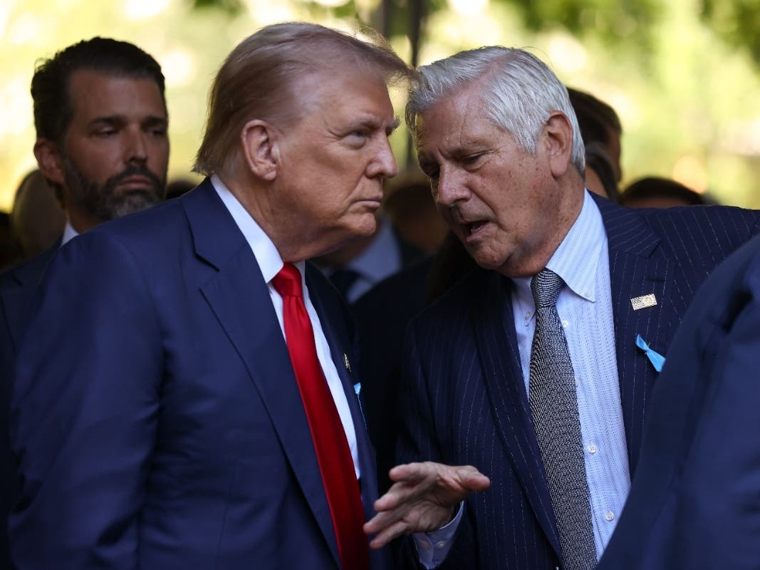 Nassau County executive Bruce Blakeman talks to Republican presidential nominee, former President Donald Trump during a 911 memorial ceremony in New York, Sept. 11, 2024.