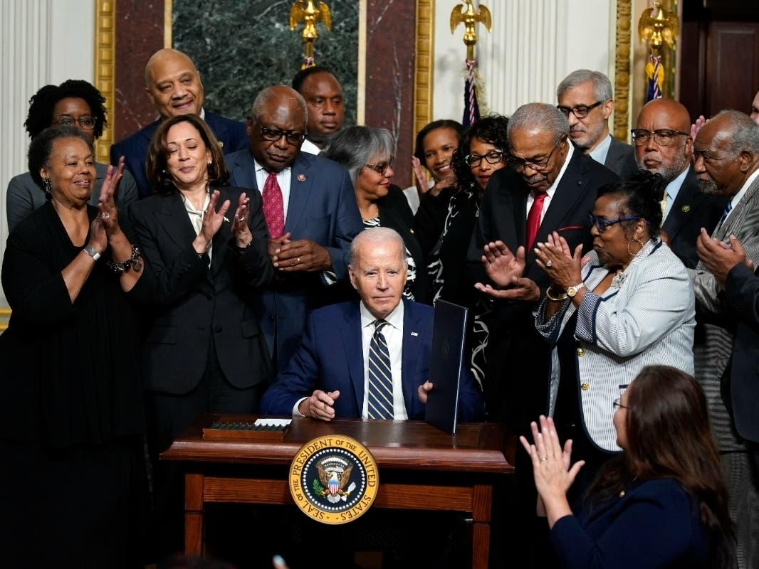 President Joe Biden signs a proclamation to establish the Emmett Till and Mamie Till-Mobley National Monument, in the Indian Treaty Room on the White House campus, Tuesday, July 25, 2023, in Washington. 
