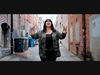 April Ryan-Grisman of Novato records the video for 'Mr. President,' the first single from the reggae band Kana Mota.