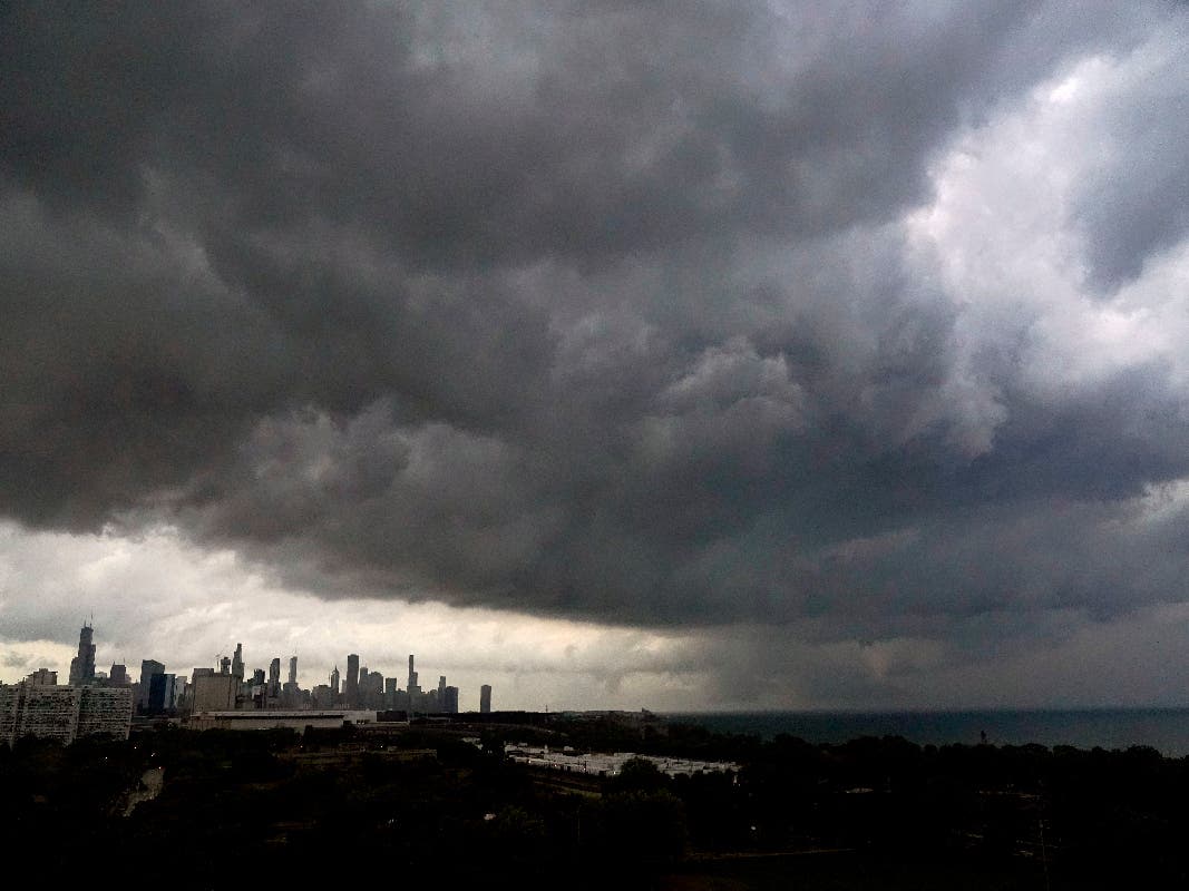 Storm clouds pass over downtown Chicago and the Bronzeville neighborhood of the city heading East out over Lake Michigan as the National Weather Service continued to issue multiple tornado warnings in the greater metropolitan area Wednesday, July 12, 2023