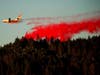 An air tanker drops retardant while battling the Kincade Fire near Healdsburg, California on Tuesday.