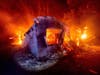 Flames from the LNU Lightning Complex fires consume a home in unincorporated Napa County, Calif., on Wednesday, Aug. 19, 2020. 