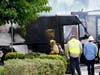 Fire and safety crews work the scene of a small plane crash, Monday, Oct. 11, 2021, in Santee, Calif. 