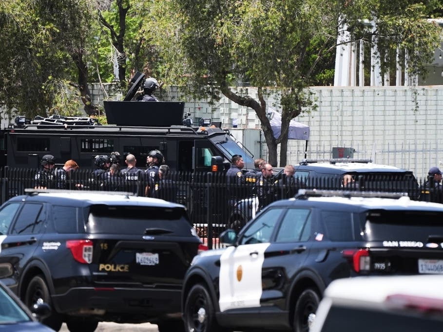 Police stage at the scene of a shooting outside the Islamic Center of San Diego Monday, May 18, 2026, in San Diego.