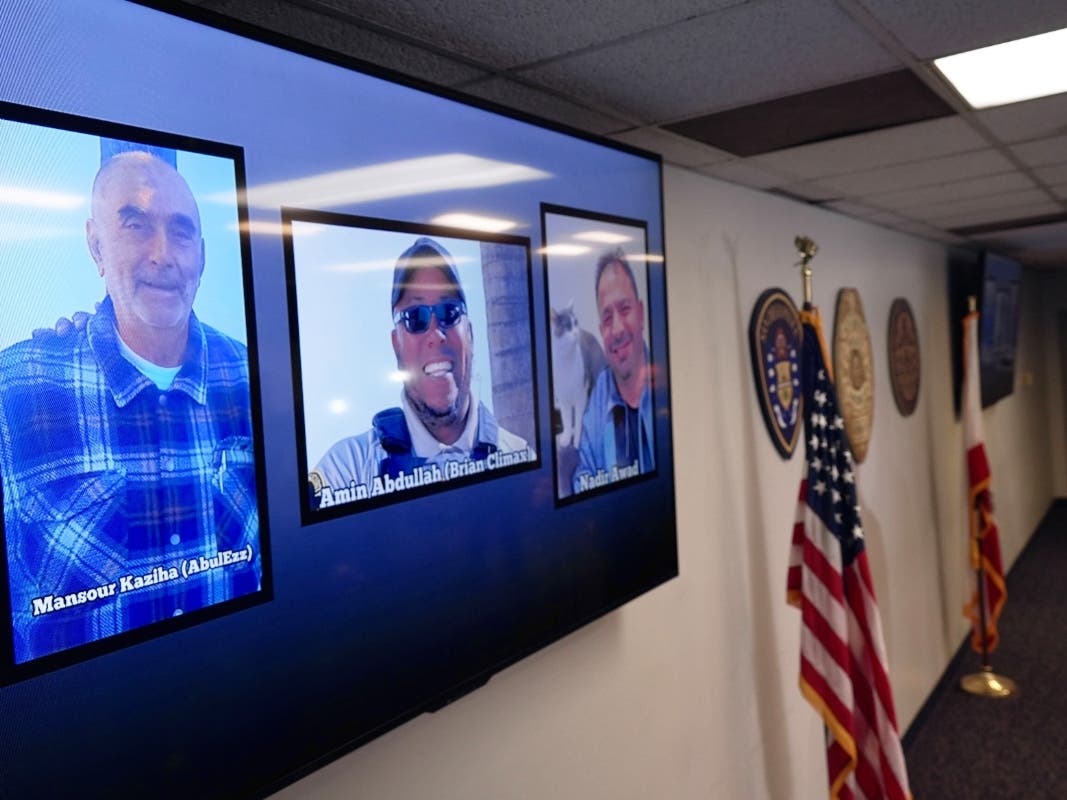 Photos of the three victims at the Islamic Center of San Diego are displayed after a news conference in San Diego, Calif., Tuesday, May 19, 2026.