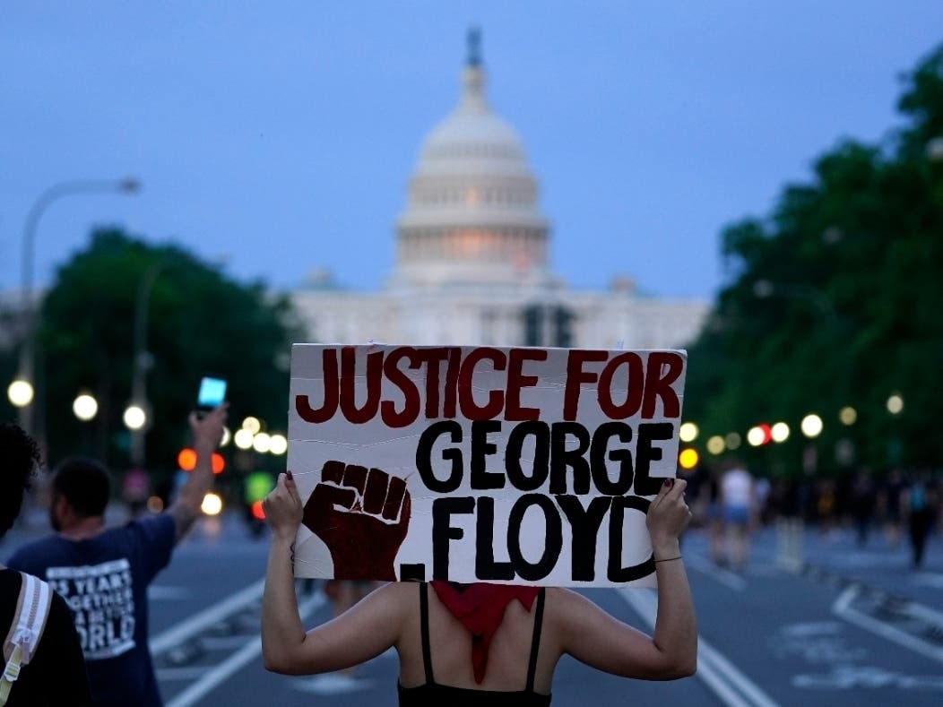 Minneapolis Police Death Washington ProtestDemonstrators walk along Pennsylvania Avenue as they protest the death of George Floyd.