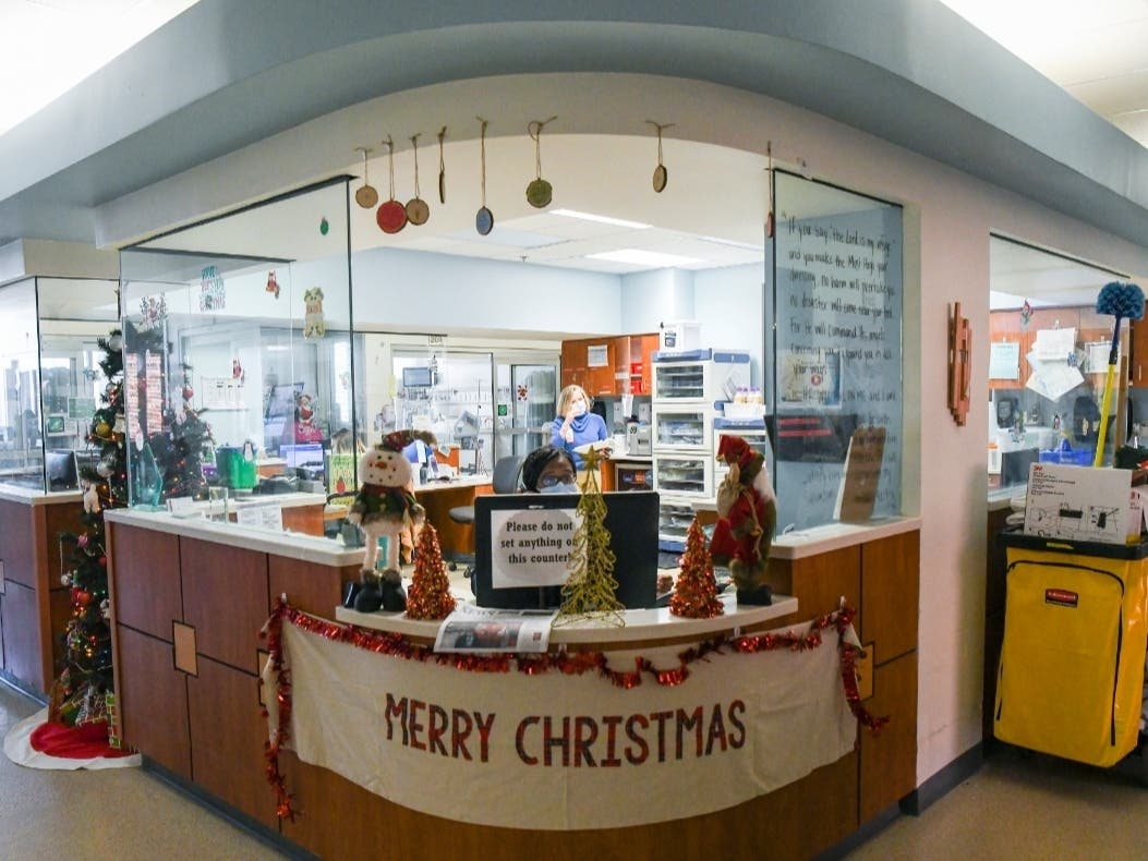 The nurse's station is decorated for Christmas in the intensive care unit at East Alabama Medical Center in Opelika, Alabama.