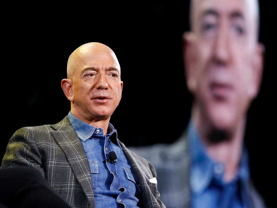 In this June 6, 2019, file photo Amazon CEO Jeff Bezos speaks at the the Amazon re:MARS convention in Las Vegas.