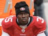 San Francisco 49ers cornerback Phillip Adams sits on the sideline during an NFL football game Oct. 17, 2010, in San Francisco.