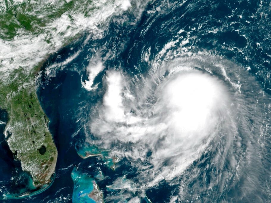 A satellite image shows Tropical Storm Henri in the Atlantic Ocean. Henri was expected to intensify into a hurricane by Saturday.