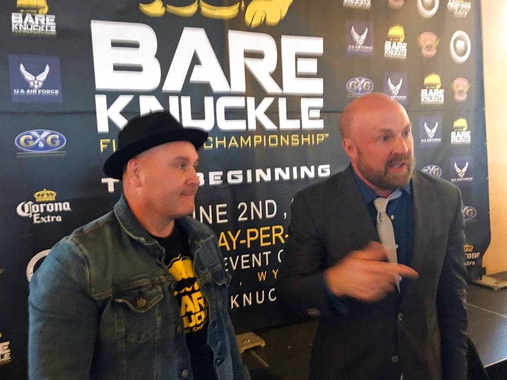 Bobby Gunn, left, and Bryan Pedersen, chairman of the Wyoming State Board of Mixed Martial Arts, speak with reporters during a 2018 news conference to promote a bare-knuckle boxing event.