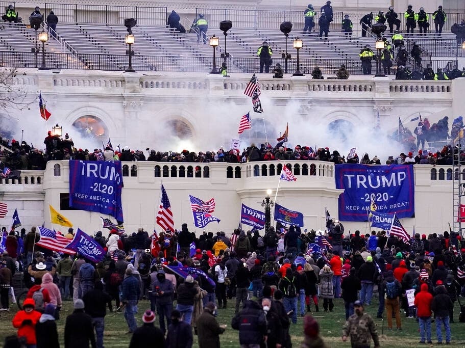 Violent insurrectionists loyal to President Donald Trump, storm the Capitol, Jan. 6, 2021, in Washington.