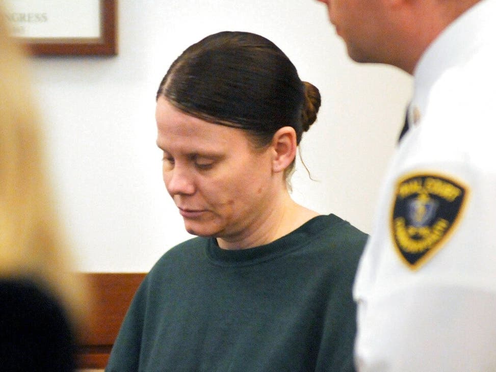Julie Corey stands in Worcester Superior Court on Feb. 18, 2014, where she was sentenced to life in prison for the 2009 murder of Darlene Haynes.