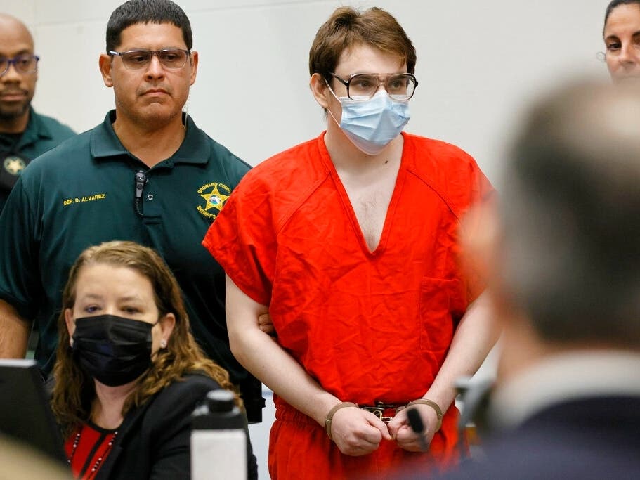 Marjory Stoneman Douglas High School shooter Nikolas Cruz is escorted into the courtroom for a hearing regarding possible jury misconduct during deliberations in the penalty phase of his trial.
