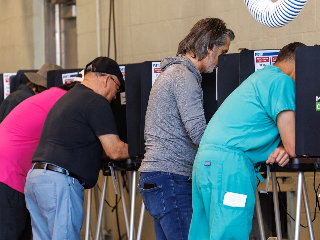 Voters cast their ballots during the midterm elections in Miami-Dade County at the Miami Beach Fire Department - Station 4 on Tuesday in Miami Beach.