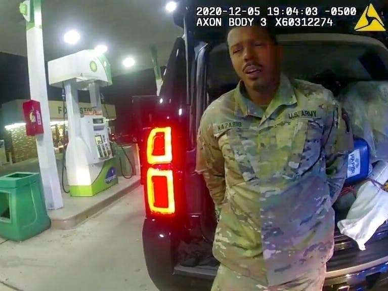 In this image made from Windsor, Virginia, police video, a police officer speaks with Caron Nazario during a traffic stop on Dec. 20, 2020. 
